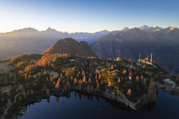 Aerial view of Lago Marcio in autumn at sunset. Branzi, Val Brembana, Alpi Orobie, Bergamo, Bergamo Province, Lombardy, Italy, Europe.