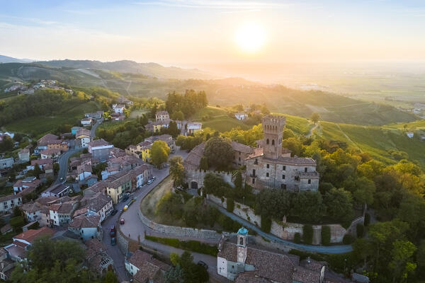Aerial view of a summer sunset over the Cigognola castle. Cigognola, Oltrepo Pavese, Pavia district, Lombardy, Italy.
