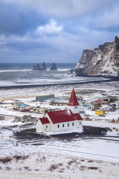 View of Víkurkirkja, Vik's church with red rooftop. Vik i Myrdal, Sudurland, Iceland, Northern Europe.