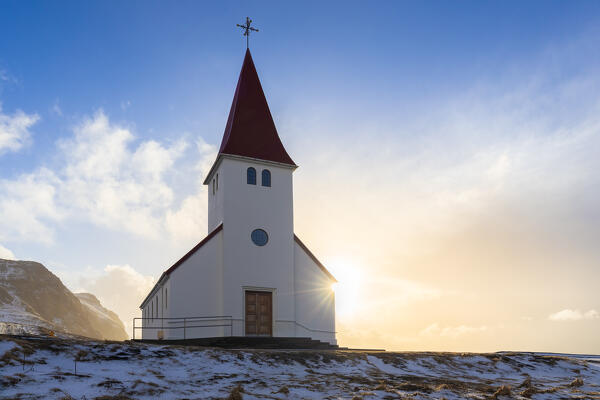 View of Víkurkirkja, Vik's church with red rooftop. Vik i Myrdal, Sudurland, Iceland, Northern Europe.