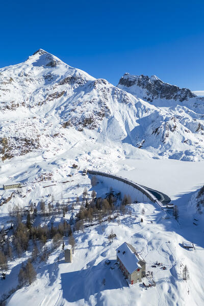 Aerial view of Laghi Gemelli, the dam and it's refuge. Branzi, Val Brembana, Alpi Orobie, Bergamo, Bergamo Province, Lombardy, Italy, Europe.