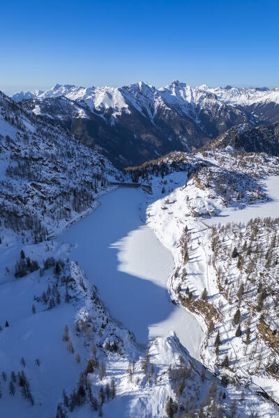 Aerial view of Lago Piano Casere in winter. Branzi, Val Brembana, Alpi Orobie, Bergamo, Bergamo Province, Lombardy, Italy, Europe.