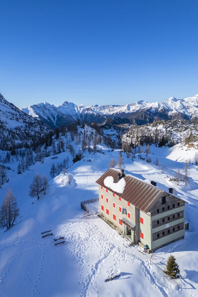 Aerial view of Laghi Gemelli refuge in winter. Branzi, Val Brembana, Alpi Orobie, Bergamo, Bergamo Province, Lombardy, Italy, Europe.