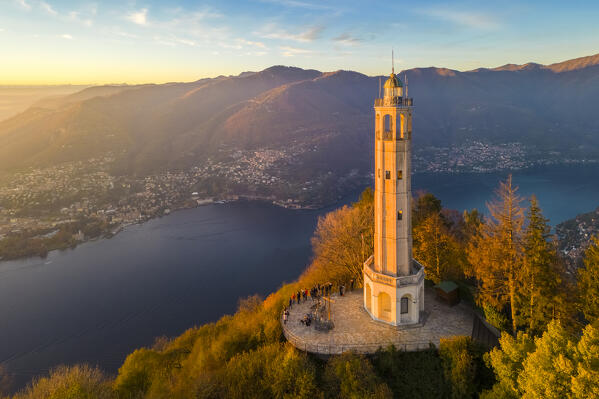 Aerial view of the Faro Voltiano (Volta Lighthouse) of Brunate overlooking Como and Como Lake in autumn. Brunate, Province of Como, Lombardy, Italy, Europe.