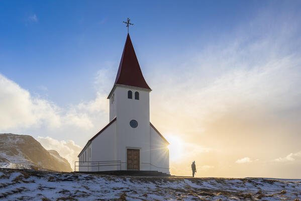 View of Víkurkirkja, Vik's church with red rooftop. Vik i Myrdal, Sudurland, Iceland, Northern Europe.