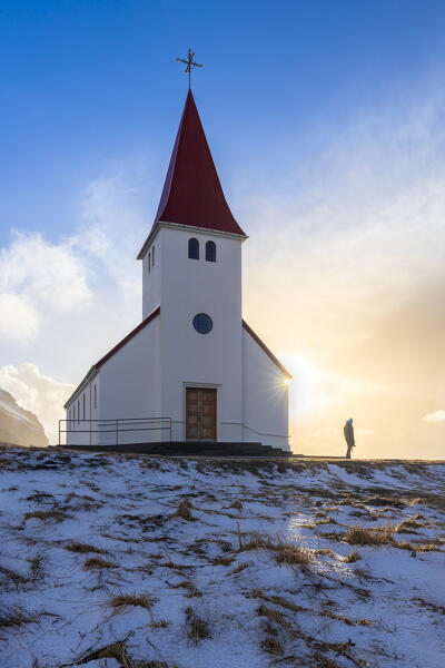 View of Víkurkirkja, Vik's church with red rooftop. Vik i Myrdal, Sudurland, Iceland, Northern Europe.