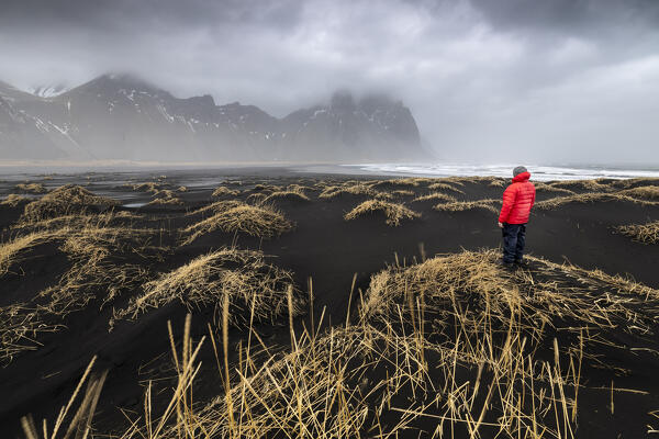 View of the black sand dunes in front of Vestrahorn mountain. Stokksnes peninsula, Hofn, Austurland, Iceland, Europe.