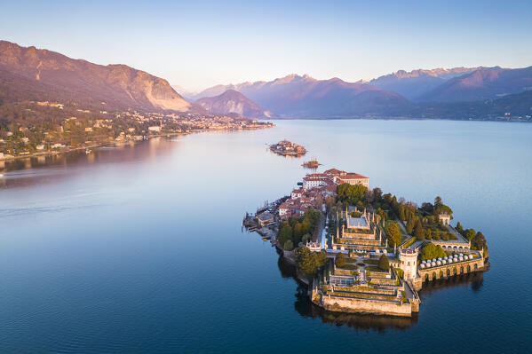 Aerial view of the Borromean Islands during a winter sunrise. Stresa, Lago Maggiore, Verbano Cusio Ossola district, Piedmont, Italy.