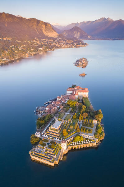 Aerial view of the Borromean Islands during a winter sunrise. Stresa, Lago Maggiore, Verbano Cusio Ossola district, Piedmont, Italy.