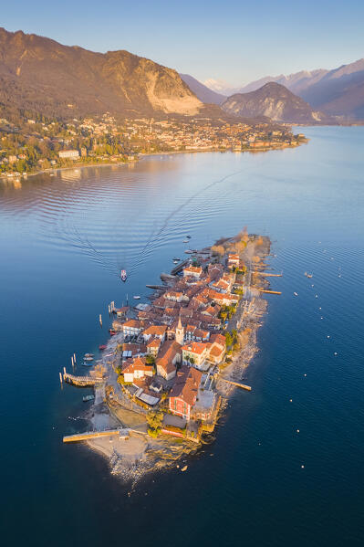 Aerial view of the Borromean Islands during a winter sunrise. Stresa, Lago Maggiore, Verbano Cusio Ossola district, Piedmont, Italy.