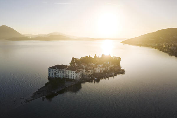 Aerial view of the Borromean Islands during a winter sunrise. Stresa, Lago Maggiore, Verbano Cusio Ossola district, Piedmont, Italy.