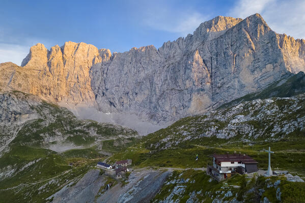 Aerial view of the Albani refuge and the north face of the Presolana at dawn. Val di Scalve, Bergamo district, Lombardy, Italy, Southern Europe.
