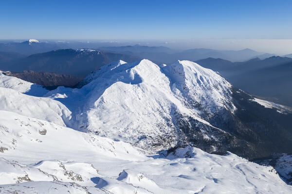 Aerial view of the top Pizzo Arera in winter covered in snow. Val Serina, Zambla Alta, Bergamo district, Lombardy, Italy, Southern Europe.