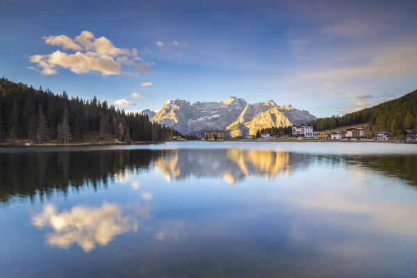 View of the Misurina Lake with Sorapis mountain group behind in autumn. Dolomites, Auronzo di Cadore, Belluno, Veneto, Italy.