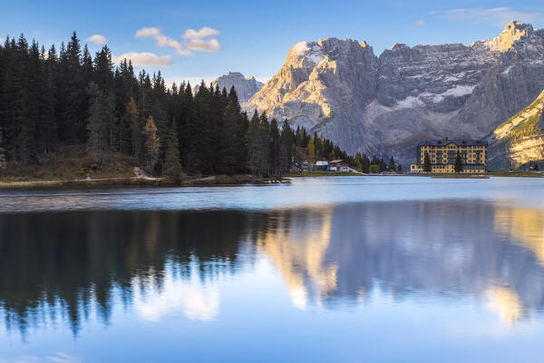 View of the Misurina Lake with Sorapis mountain group behind in autumn. Dolomites, Auronzo di Cadore, Belluno, Veneto, Italy.