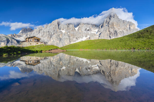 View of Baita Segantini refuge and Pale di San Martino in Dolomites. Trento province, Trentino Alto Adige, Italy, Europe.