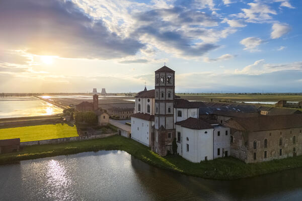 Aerial view of the flooded rice fields near the Principality of Lucedio at sunset. Trino Vercellese, Vercelli district, Piedmont, Italy.
