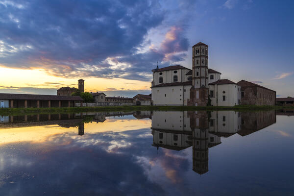 View of the flooded rice fields near the Principality of Lucedio at sunset. Trino Vercellese, Vercelli district, Piedmont, Italy.