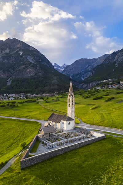 Spring sunset over the church of Premadio. Bormio, Valtellina, Lombardy, Italy, Europe.