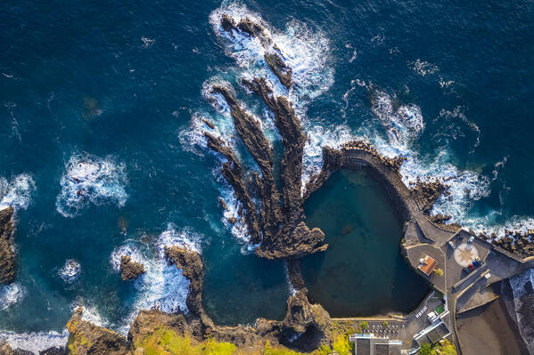 Aerial view of the natural pools on the coast of Seixal during sunrise. Madeira, Portugal, Europe.