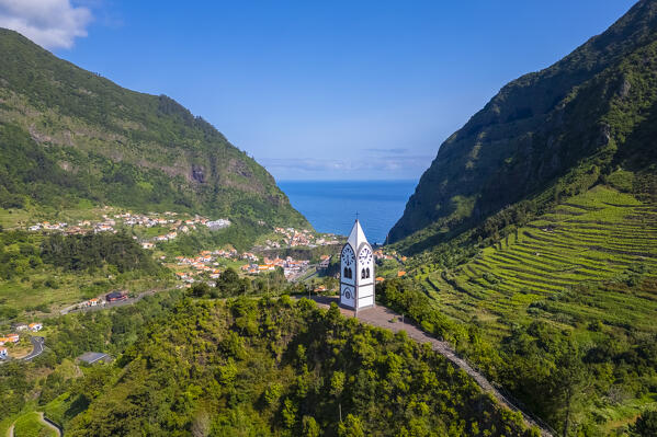 Aerial view of the amazing lighthouse called Farol da Ponta do Pargo at sunset in spring. Madeira, Portugal, Europe.