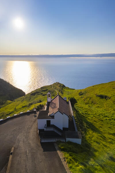 Aerial view of the small church called Capela de Nossa Senhora da Boa Morte at sunset in spring. Lombada Velha, Madeira, Portugal, Europe.