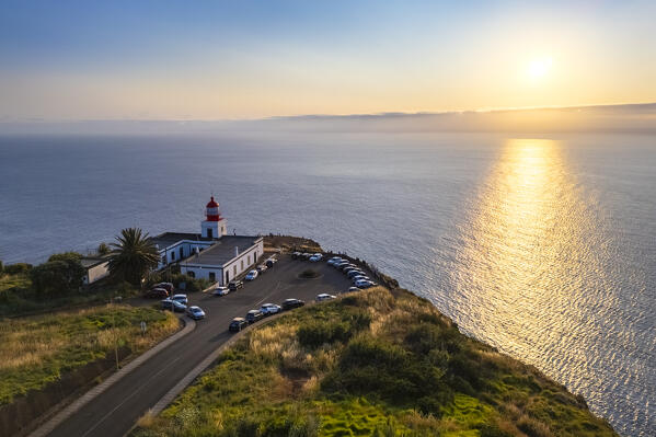 Aerial view of the amazing lighthouse called Farol da Ponta do Pargo at sunset in spring. Madeira, Portugal, Europe.