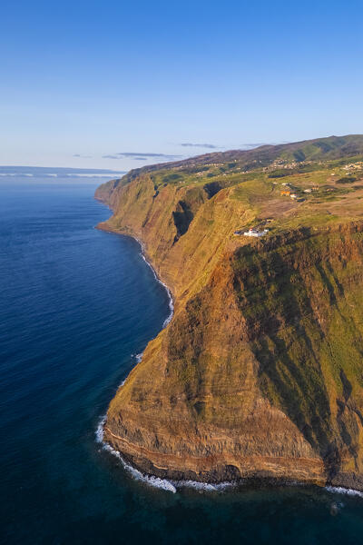 Aerial view of the amazing lighthouse called Farol da Ponta do Pargo at sunset in spring. Madeira, Portugal, Europe.