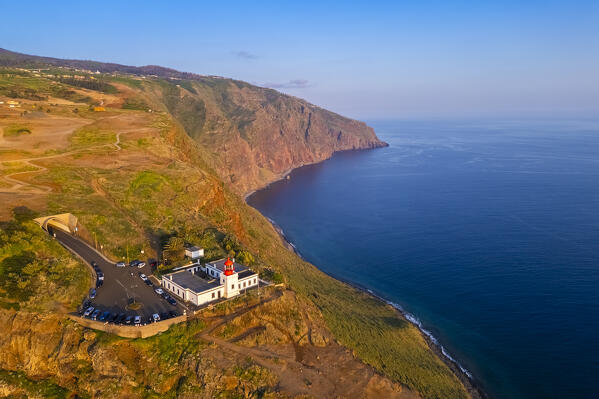 Aerial view of the amazing lighthouse called Farol da Ponta do Pargo at sunset in spring. Madeira, Portugal, Europe.