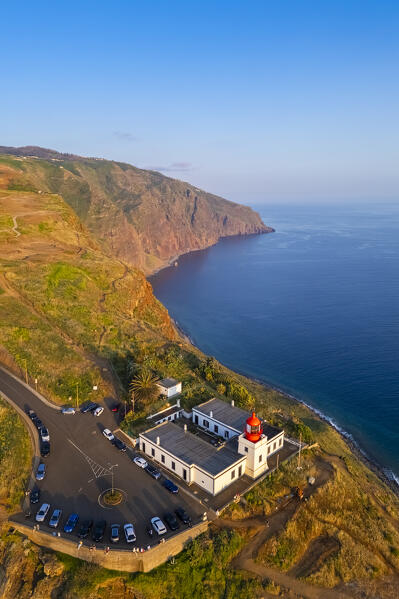 Aerial view of the amazing lighthouse called Farol da Ponta do Pargo at sunset in spring. Madeira, Portugal, Europe.