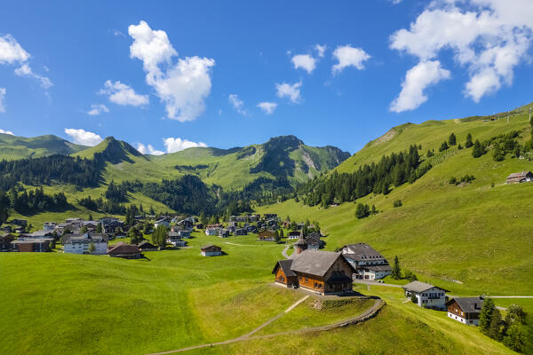 Aerial view of the church of the small village of Stoos. Stoos, Canton of Schwyz, Schwyzer Alps, Switzerland.
