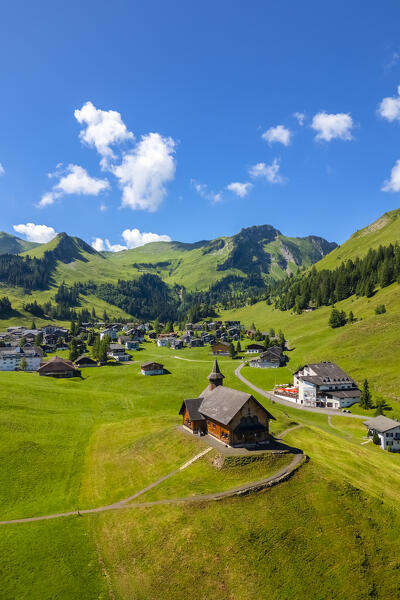 Aerial view of the church of the small village of Stoos. Stoos, Canton of Schwyz, Schwyzer Alps, Switzerland.
