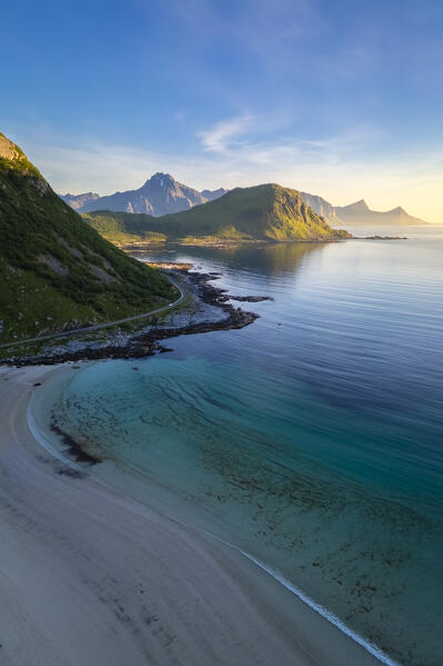 Aerial view of turquoise water around Haukland and Vik beach in summer during midnight sun. Vestvagoy, Nordland, Lofoten Islands, Norway.