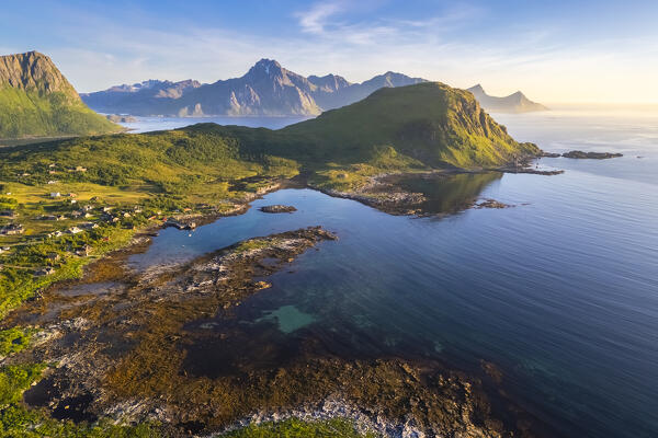 Aerial view of turquoise water around Haukland and Vik beach in summer during midnight sun. Vestvagoy, Nordland, Lofoten Islands, Norway.