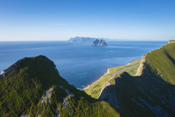 Aerial view of the rocky peaks and beaches of the island of Vaeroy. Sorland, Vaeroy, Nordland, Lofoten, Norway, Europe.