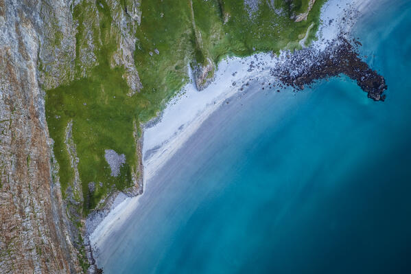 Aerial view of the rocky peaks and beaches of the island of Vaeroy. Sorland, Vaeroy, Nordland, Lofoten, Norway, Europe.