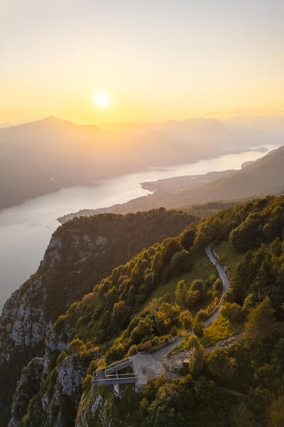 Aerial view of the Belvedere Parco Valentino viewpoint at sunset in summer. Abbadia Lariana, Lecco province, Lombardy, Italy, Europe.