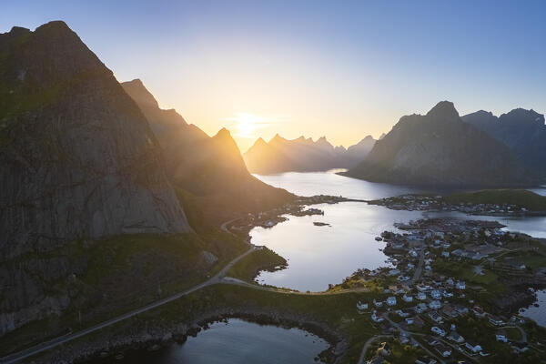 Aerial view of the Reine Bay and town in summer during sunset. Reine, Lofoten Islands, Norway.