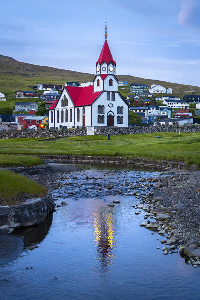 View of the Sandavágs Kirkja at night in spring. Sandavagur,  Vagar, Faroe island, Denmark, Europe.