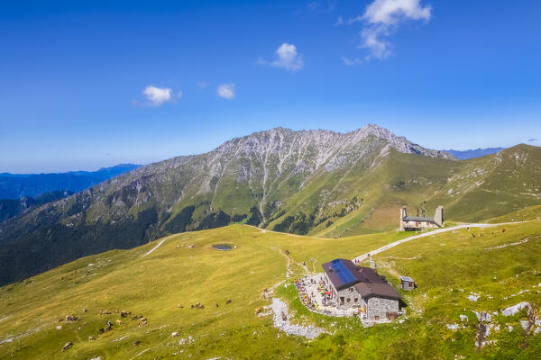 Aerial view of the Rifugio Capanna 2000 at the foothills of Pizzo Arera in summer. Val Serina, Zambla Alta, Bergamo district, Lombardy, Italy, Southern Europe.