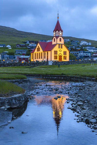 View of the Sandavágs Kirkja at night in spring. Sandavagur, Vagar, Faroe island, Denmark, Europe.