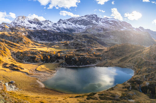 Aerial view of the Rifugio Calvi and Rotondo lake at sunset in autumn. Carona, Val Brembana, Alpi Orobie, Bergamo, Bergamo Province, Lombardy, Italy, Europe.