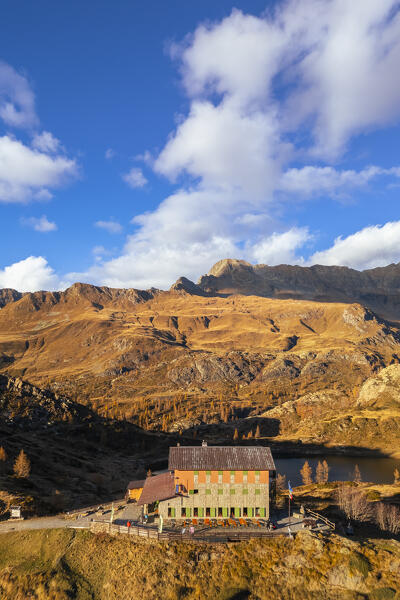 Aerial view of the Rifugio Calvi in autumn at sunset. Carona, Val Brembana, Alpi Orobie, Bergamo, Bergamo Province, Lombardy, Italy, Europe.
