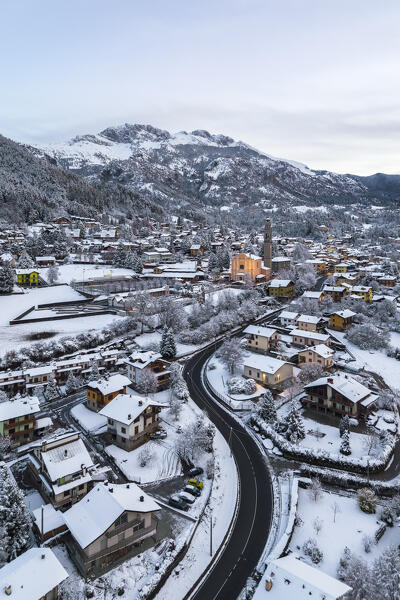 Aerial view of Castione della Presolana after a snowfall in winter. Val Seriana, Bergamo district, Lombardy, Italy.