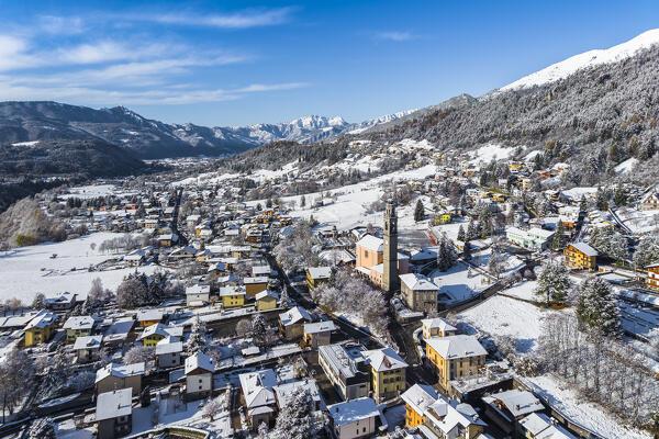 Aerial view of Castione della Presolana after a snowfall in winter. Val Seriana, Bergamo district, Lombardy, Italy.