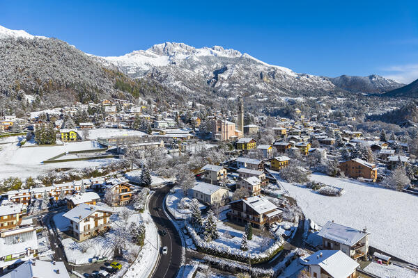 Aerial view of Castione della Presolana after a snowfall in winter. Val Seriana, Bergamo district, Lombardy, Italy.
