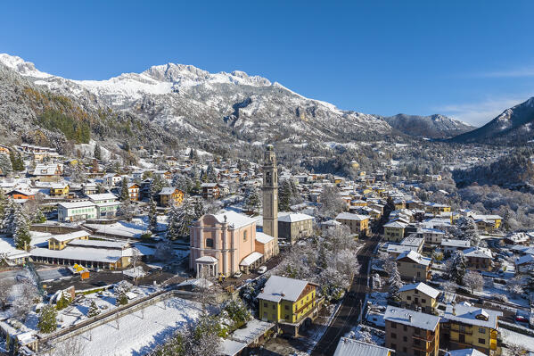 Aerial view of Castione della Presolana after a snowfall in winter. Val Seriana, Bergamo district, Lombardy, Italy.