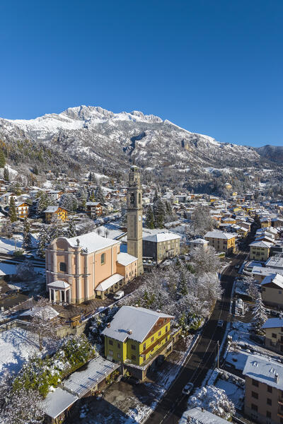 Aerial view of Castione della Presolana after a snowfall in winter. Val Seriana, Bergamo district, Lombardy, Italy.