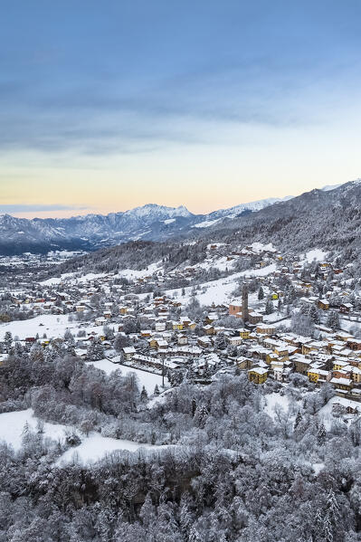 Aerial view of Castione della Presolana after a snowfall in winter. Val Seriana, Bergamo district, Lombardy, Italy.