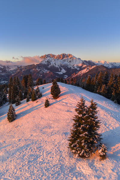 View of the Presolana during a winter sunset from Monte Pora, Val Seriana, Bergamo district, Lombardy, Italy.
